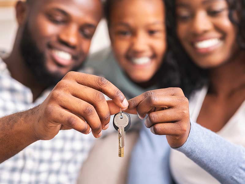 A family holds keys to a house